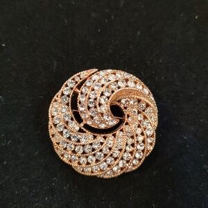 Elegant Gold and Silver Swirl Brooch